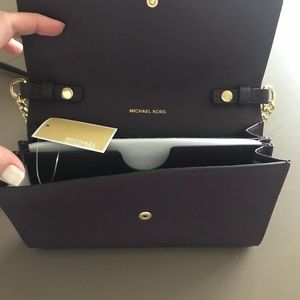 Michael Kors Bags - Purple cross body purse. Michael Kors Bags - Purple cross body purse.